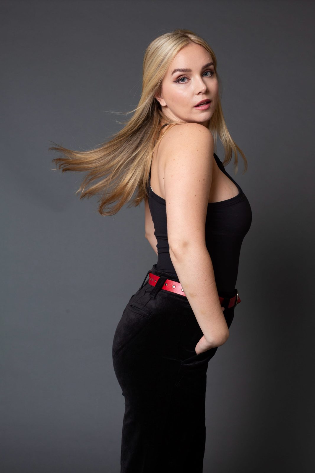 Black tank with red belt