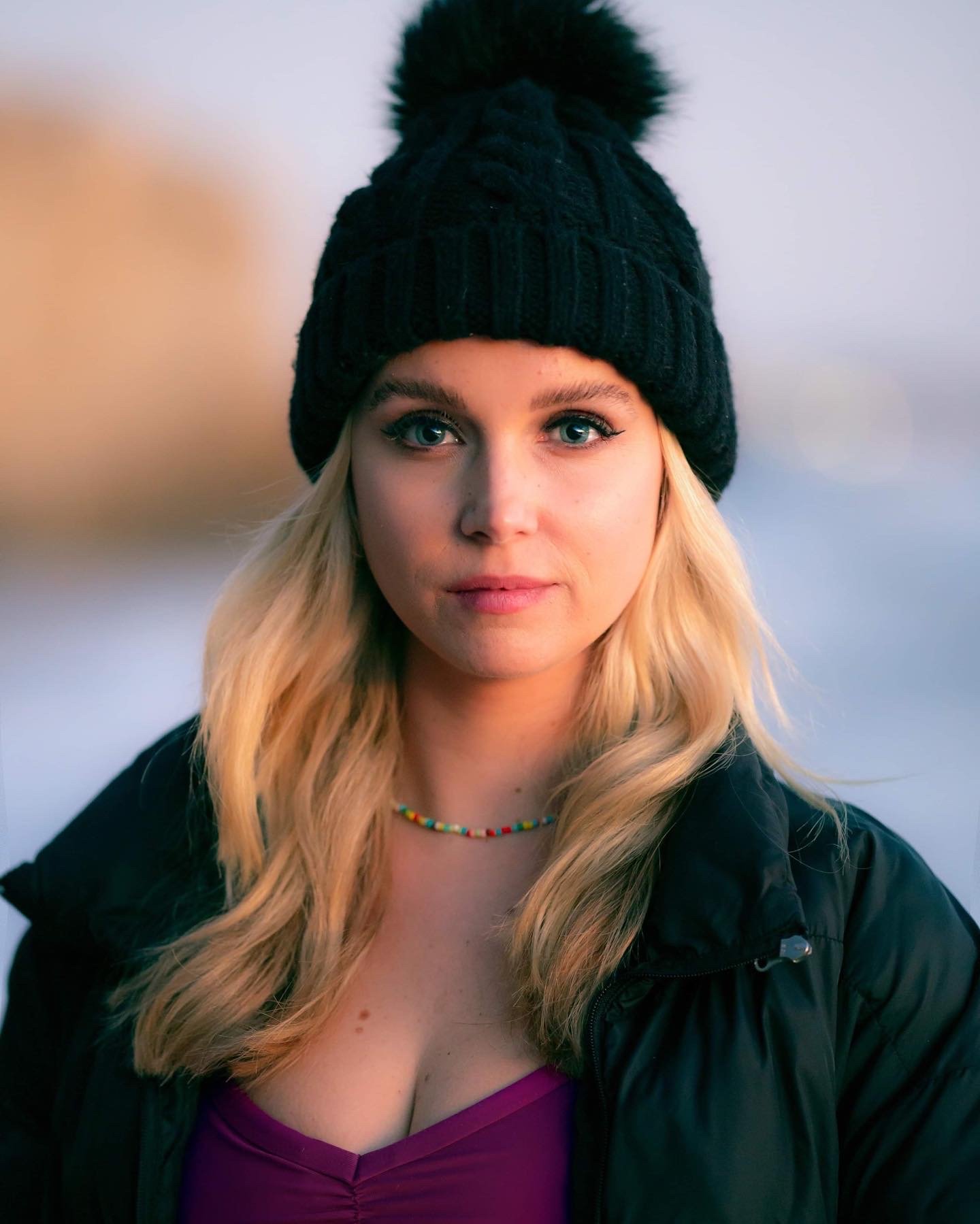 Winter portrait with black knit beanie