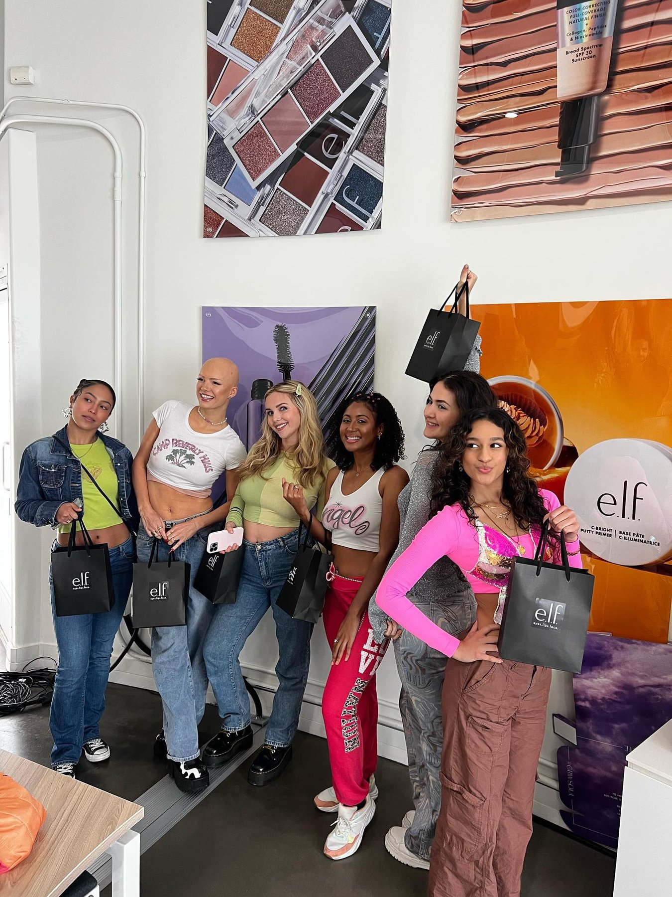 Group photo on set at the e.l.f. Cosmetics live shopping space